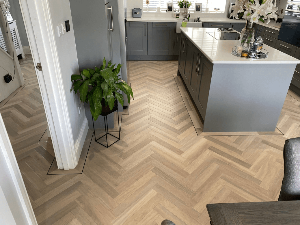 Luxury herringbone LVT flooring installed by Elite Flooring Surrey