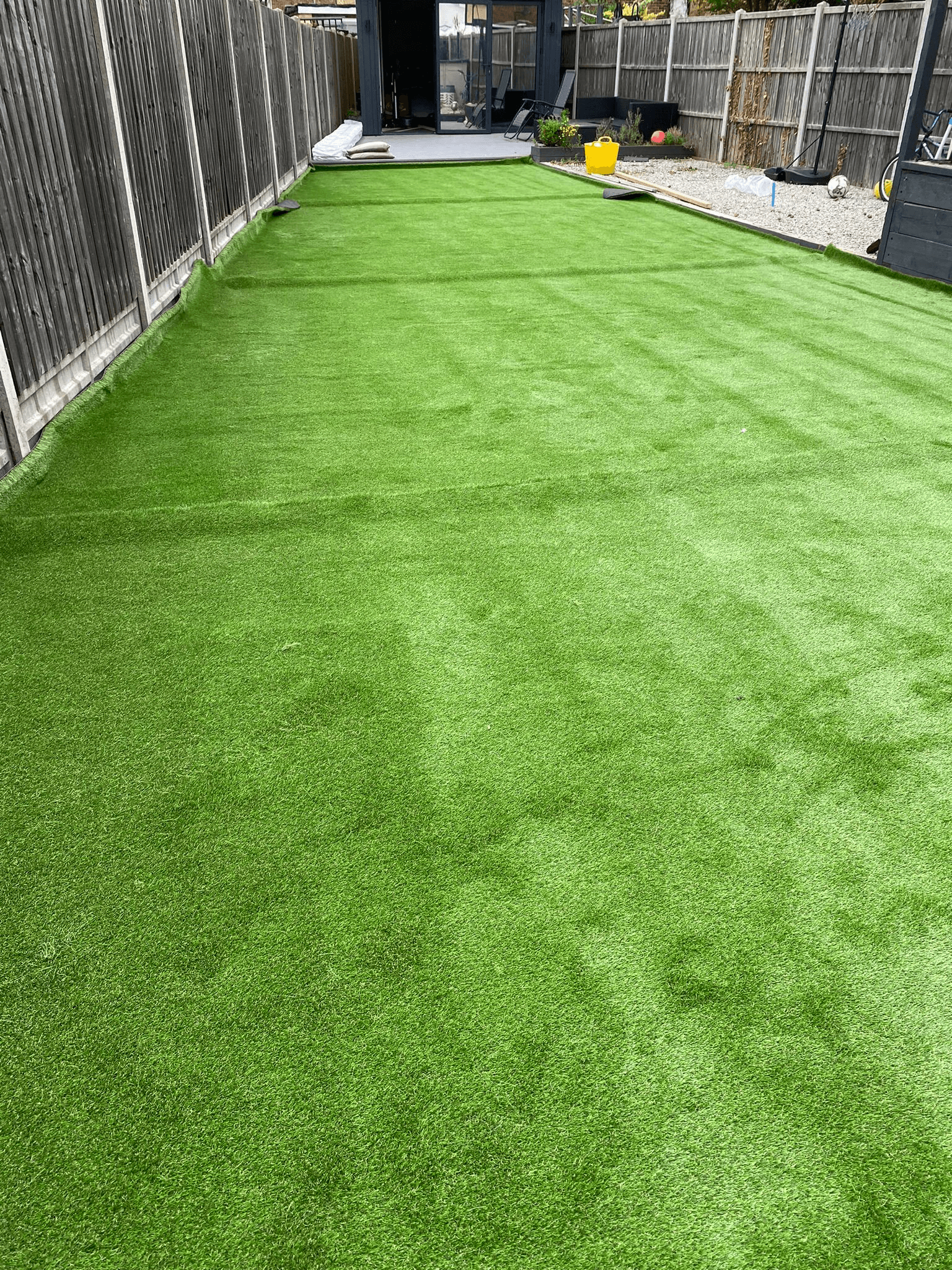 Artificial grass installed in a residential back garden
